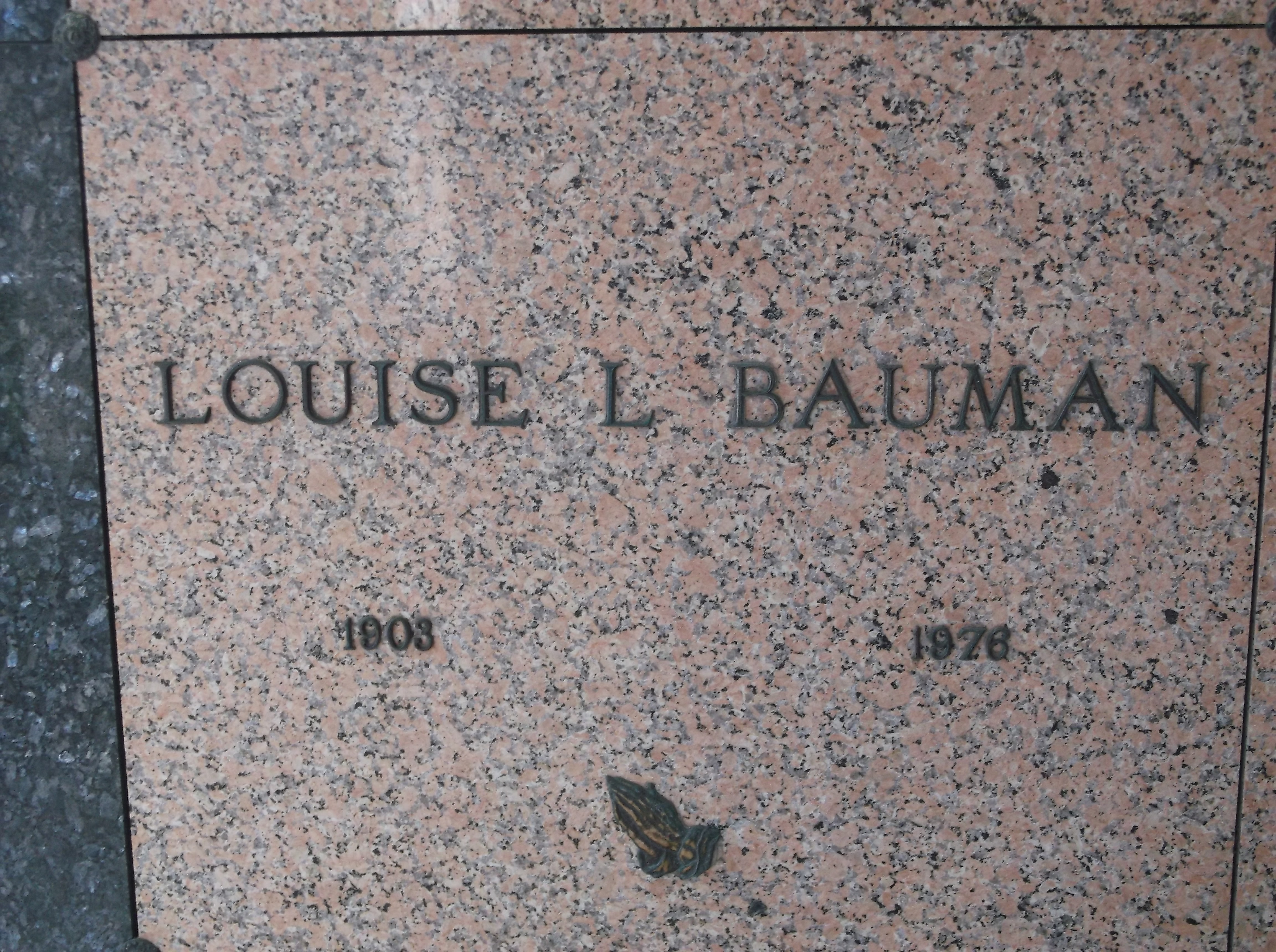 Louise L Bauman